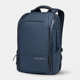Nomatic Travel Pack 20L-30L in navy, featuring multiple compartments, padded straps, and sleek design for versatile travel storage.