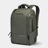 Nomatic Travel Pack 20L-30L in olive green, featuring multiple compartments and adjustable straps for versatile travel storage.