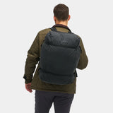 Black Nomatic Navigator collapsible duffel bag with 42L capacity, shown folded and expanded for travel use.