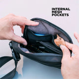 Nomatic Access Sling in navy with graphic design, compact daily sling bag for essentials, made by Nomatic.
