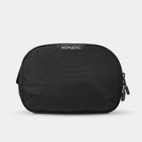 Black Nomatic Access Sling bag with adjustable strap, compact design, and front pocket for everyday essentials.