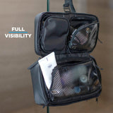 Small Nomatic toiletry bag with multiple compartments and zipper closure, designed for organized travel storage.