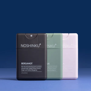 Noshinku hand sanitizer bottle with clear liquid and pump dispenser, designed for hand hygiene and germ protection.