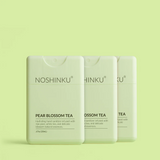 Noshinku hand sanitizer bottle with clear label, pump dispenser, and gel sanitizer inside on a clean surface.