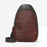 Osgoode Marley Cyrus Sling Bag in moss green with front flap and adjustable strap, stylish and practical for daily use.