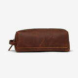 Small Osgoode Marley leather travel kit with toiletry bag featuring a compact, stylish design and leather finish for travel essentials.