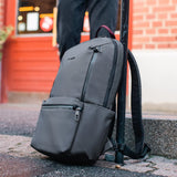 Pacsafe MetrosafeX 20L anti-theft backpack with sleek black design, padded straps, and secure zippers for daily use.