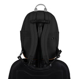 Pacsafe GO 15L anti-theft backpack in jet black with multiple compartments and secure zippers, designed for everyday use.