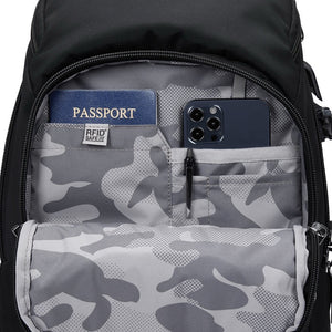 Pacsafe EXP 28L anti-theft backpack in black with padded shoulder straps and multiple compartments for secure travel storage.