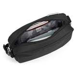 Black Pacsafe GO anti-theft crossbody bag with secure zippers and adjustable strap, designed for travel and everyday use.