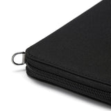 Black Pacsafe RFIDblocking travel wallet with multiple card slots and secure zip closure for safe travel.