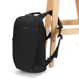 Pacsafe V 12L anti-theft tech backpack in black with padded shoulder straps and multiple compartments, designed for secure carrying.