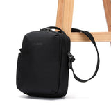 Black Pacsafe V anti-theft Tour crossbody bag with secure zipper and adjustable strap, designed for safe everyday carrying.