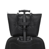 Large Pacsafe anti-theft carryall tote bag with secure zippers and padded handles, designed for stylish everyday use.