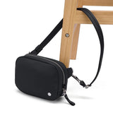 Pacsafe W Anti-Theft Micro Sling bag in black with secure zippers and adjustable strap, designed for compact everyday carry.