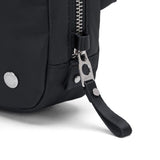 Pacsafe Anti-Theft Micro Sling bag with adjustable strap, compact design, and secure zipper closure for everyday use.