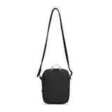 Pacsafe GO anti-theft micro crossbody bag in black with adjustable strap, compact design, and secure zipper closures.