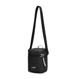 Pacsafe GO anti-theft micro crossbody bag in black with adjustable strap and secure zipper closure, designed for everyday use.