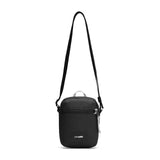 Pacsafe GO anti-theft micro crossbody bag in black, compact with secure zippers and adjustable strap for everyday use.