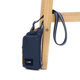 Pacsafe Go Anti-Theft Tech Crossbody bag in coastal blue with secure zippers and adjustable strap, designed for everyday use.