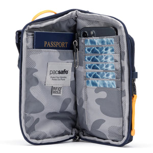 Pacsafe Go Anti-Theft Tech Crossbody Bag in Coastal Blue with secure zippers and adjustable strap for travel and everyday use.