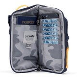 Pacsafe Go Anti-Theft Tech Crossbody Bag in Coastal Blue with secure zippers and adjustable strap for travel and everyday use.