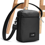 Black Pacsafe GO Anti-Theft Festival Crossbody bag with adjustable strap and secure zipper closure.