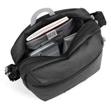 Pacsafe GO anti-theft festival crossbody bag in jet black with secure zipper and adjustable strap, designed for outdoor use.