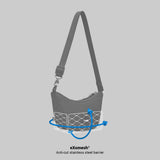 Pacsafe Go Anti Theft Lunar Crossbody bag in black with adjustable strap, compact design, and secure zipper closure for daily use.