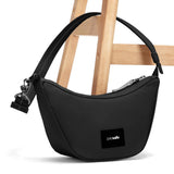 Pacsafe Go Anti Theft Lunar Crossbody Bag in Jet Black, compact design with secure zippers and adjustable strap for everyday use.
