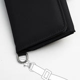 Pacsafe RFIDsafe RFID blocking trifold wallet with multiple card slots and secure design, displayed open showing interior compartments.