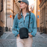 Pacsafe V Anti-theft Companion Crossbody bag with secure zippers and adjustable strap, designed for everyday use.