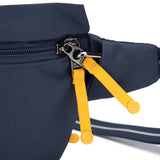 Pacsafe GO Anti-Theft Sling Pack in Coastal Blue, compact crossbody sling bag with secure zippers and adjustable strap.