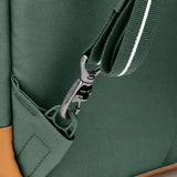 Pacsafe GO 25L anti-theft travel backpack in spruce green with secure zippers and adjustable straps.