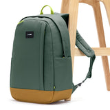 Pacsafe GO 25L anti-theft travel backpack in spruce green with multiple compartments and secure zippers.