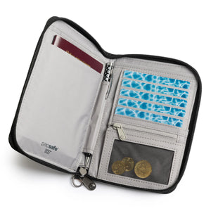 Pacsafe RFIDsafe™ black travel wallet with multiple card slots, RFID blocking features, and compact design for secure travel organization.