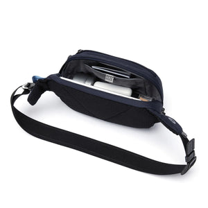 Pacsafe V anti-theft waist pack in ocean blue with multiple compartments and adjustable strap, designed for secure carrying.