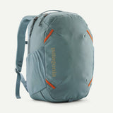 Patagonia Atom Day Pack 24L backpack in vibrant blue with multiple compartments and padded shoulder straps for comfortable carrying