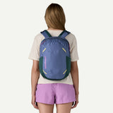 Patagonia Atom Day Pack 24L backpack in current blue with padded shoulder straps and multiple compartments for outdoor use.