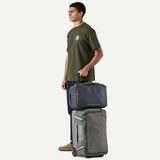 Patagonia Black Hole Micro MLC 22L backpack with black durable nylon fabric and top handle, designed for travel and daily use.