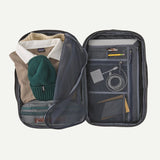 Patagonia Black Hole Micro MLC 22L backpack with durable black nylon fabric and multiple compartments for versatile storage.