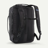 Patagonia Black Hole Micro MLC 22L backpack with durable black fabric, featuring multiple compartments and padded shoulder straps.