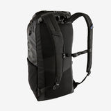 Patagonia Black Hole Pack 25L backpack with black durable fabric, adjustable straps, and zippered compartments for outdoor use.