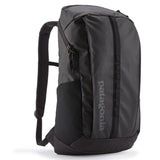 Patagonia Black Hole Pack 25L backpack in black fabric, featuring padded shoulder straps and a sleek, durable design.