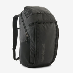 Patagonia Black Hole Pack 32L backpack with black durable fabric, adjustable straps, and multiple compartments for outdoor use.