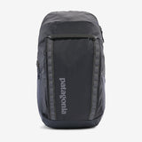 Patagonia Black Hole 32L backpack with durable black fabric, adjustable straps, and multiple compartments for outdoor gear.