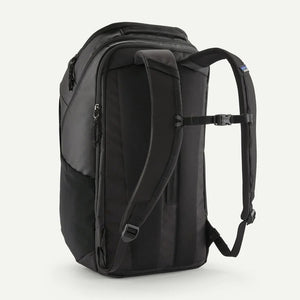 Patagonia Black Hole Pack 32L backpack with durable black fabric, adjustable straps, and multiple compartments for outdoor travel.