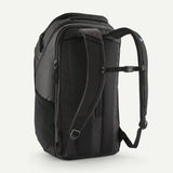 Patagonia Black Hole Pack 32L backpack with durable black fabric, adjustable straps, and multiple compartments for outdoor travel.
