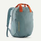 Patagonia Atom Tote Pack 20L backpack in black with adjustable shoulder straps and a front zip pocket, showcasing its spacious design.