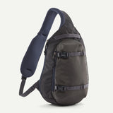 Patagonia Atom Sling Bag 8L in black with adjustable strap, compact design ideal for carrying essentials.
